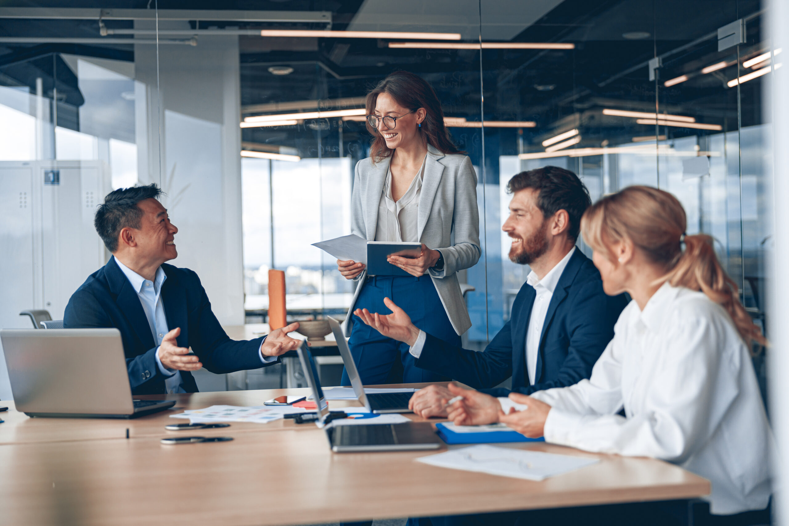Business team discussing employee health coverage in an office